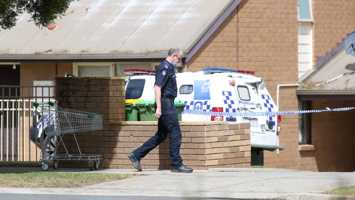 CRIME SCENE: Police at Quirk Court in Wodonga on Wednesday. 