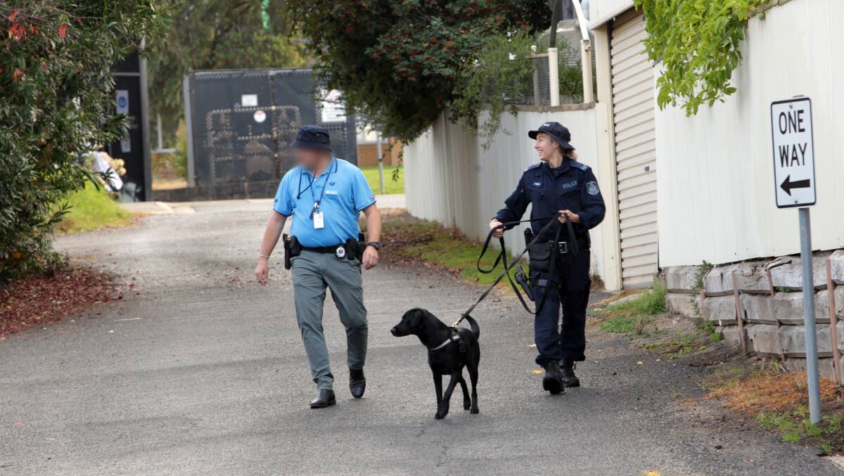 SCENE: Police search near the Albury unit following the shooting in May last year. 