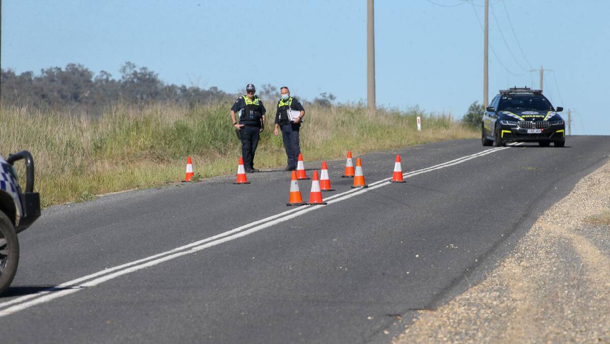 INVESTIGATION: Police examine the scene of the serious crash at Barnawartha. A man was airlifted to hospital due to the injuries he suffered. It followed a fatal crash at Wangaratta on Friday afternoon