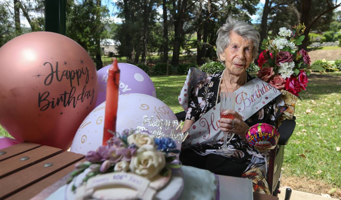 CELEBRATION: Hazel Fox has a drink in Yackandandah on Sunday after gathering with friends and family ahead of her 106th birthday on Wednesday. Picture: TARA TREWHELLA