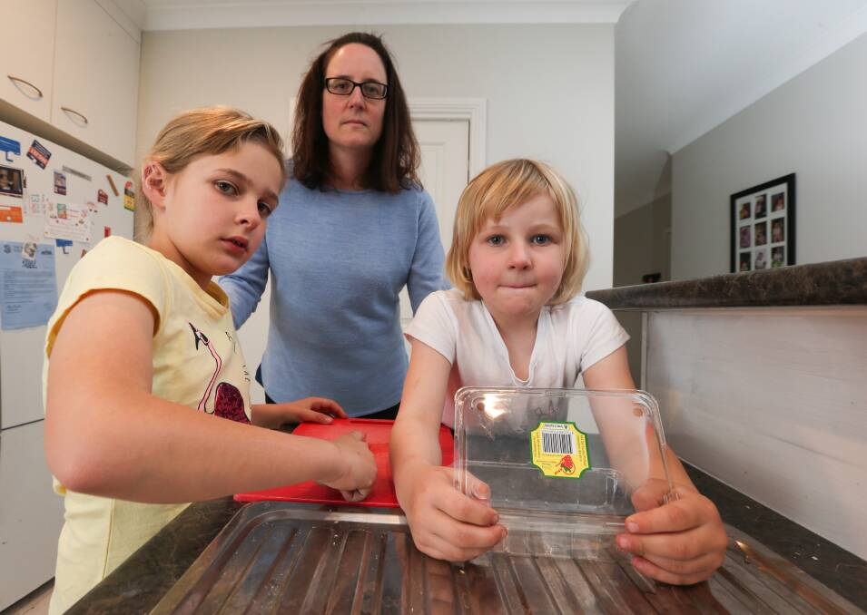 WELCOME: Lisa Church, pictured with her daughters Sophie Church and Amelia, says a $100,000 reward to catch those responsible for fruit tampering could be positive. 