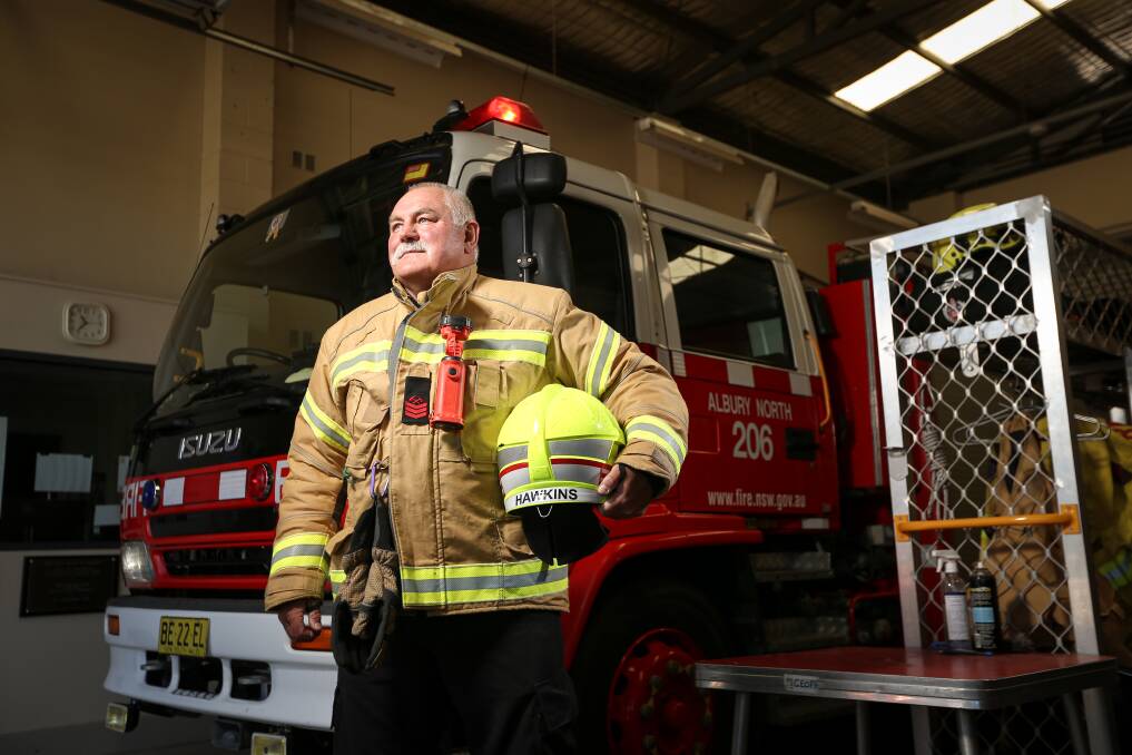 DECADES ON DUTY: John Hawkins has notched up 40 years of service as a firefighter, and has attended many of the city's biggest fires and incidents including the fire that gutted St Matthew's Church. Picture: JAMES WILTSHIRE