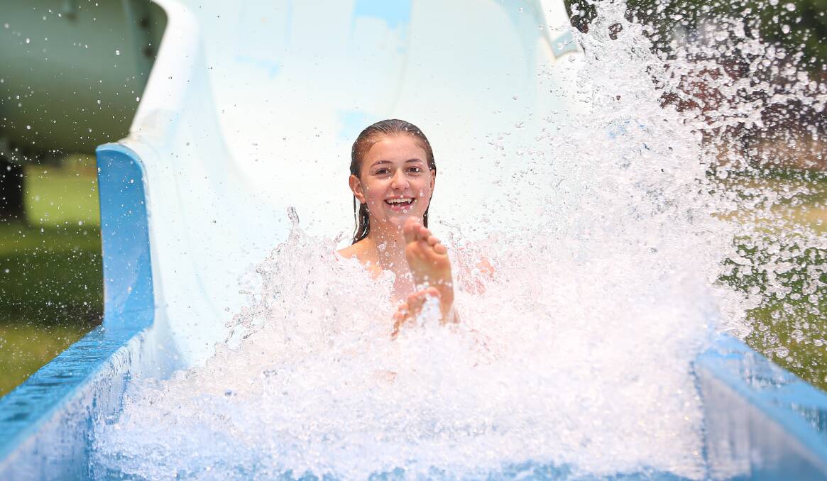 SPLASH DOWN: Lilly Hofer, 13, was on the Border for the Australian Country Junior Basketball Cup at the weekend, and took time out to attend the Albury Swim Centre on Sunday afternoon. Picture: JAMES WILTSHIRE