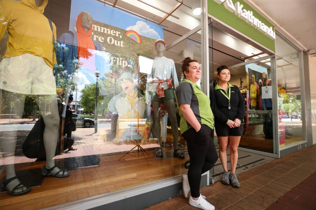 POSITIVE: Albury Kathmandu staff members Regan Russell and Alli Warne at the business, which had an increase in customers at the weekend. Picture: JAMES WILTSHIRE
