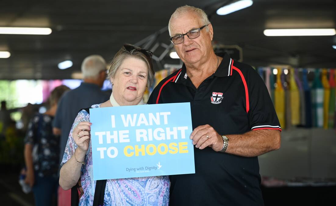 CHANGE: Kathie and Kevin Harmer voiced their support for NSW assisted dying laws in Albury on Sunday. Dozens of people gave support towards the introduction of assisted dying in the state. Picture: MARK JESSER