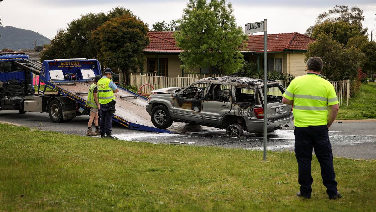 The burnt out Jeep on Tullimbar Street in North Albury on Monday morning. Picture by James Wiltshire