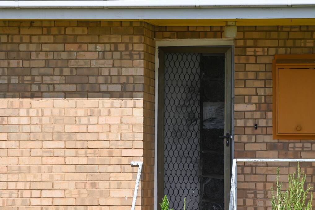 DAMAGE: Police say the offenders tried to kick in the home's front door. Picture: MARK JESSER