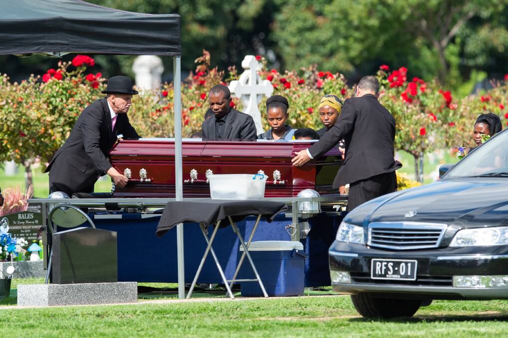 LAID TO REST: Twizere Nyiratingabandi is buried at the Wodonga Cemetery. Picture: MARK JESSER