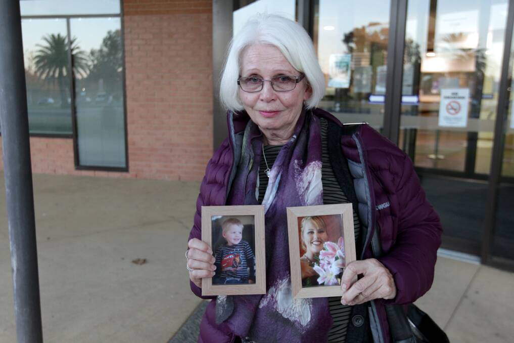 TRAGEDY: Irma Turner, pictured holding photographs of her late grandson Jack and daughter Lisa outside Wodonga court ater the guilty verdict last year.