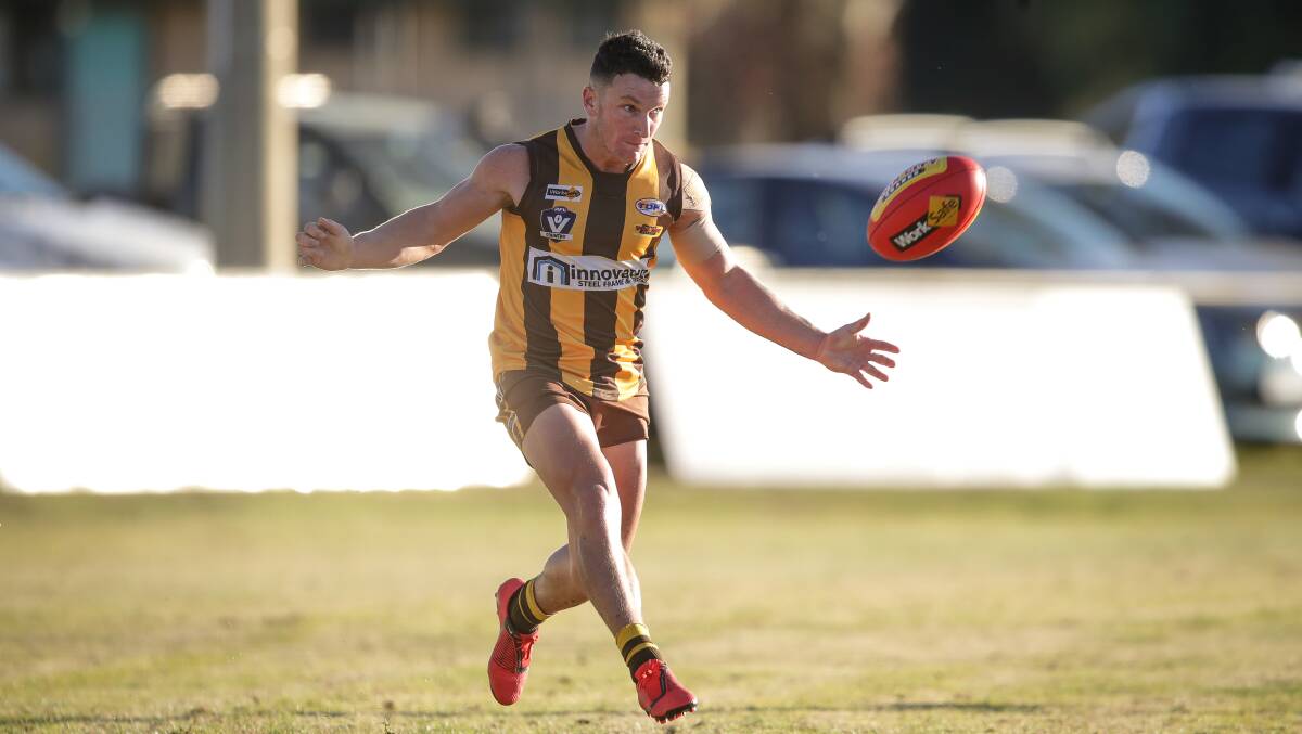 INJURED: Ben Murphy, pictured playing for Kiewa Sandy Creek. The club has supported a fundraiser to help with his medical issues following a job site fall last week. 