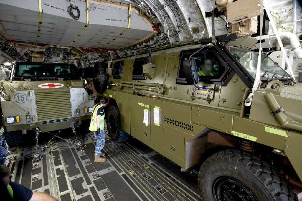 DEPLOYED: Bushmaster vehicles being readied for deployment to the battlefront in Ukraine. Bandiana-based soldiers have created maintenance education packages for soldiers to use with the 20 vehicles being gifted to the nation. 