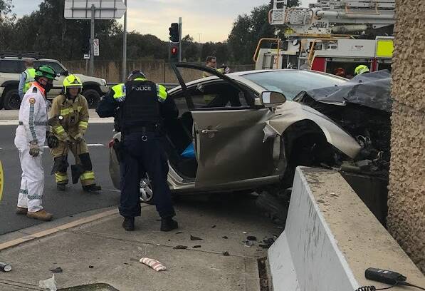 IMPACT: The vehicle hit the barrier and wall at high speed. Picture: ALBURY AND BORDER RESCUE SQUAD
