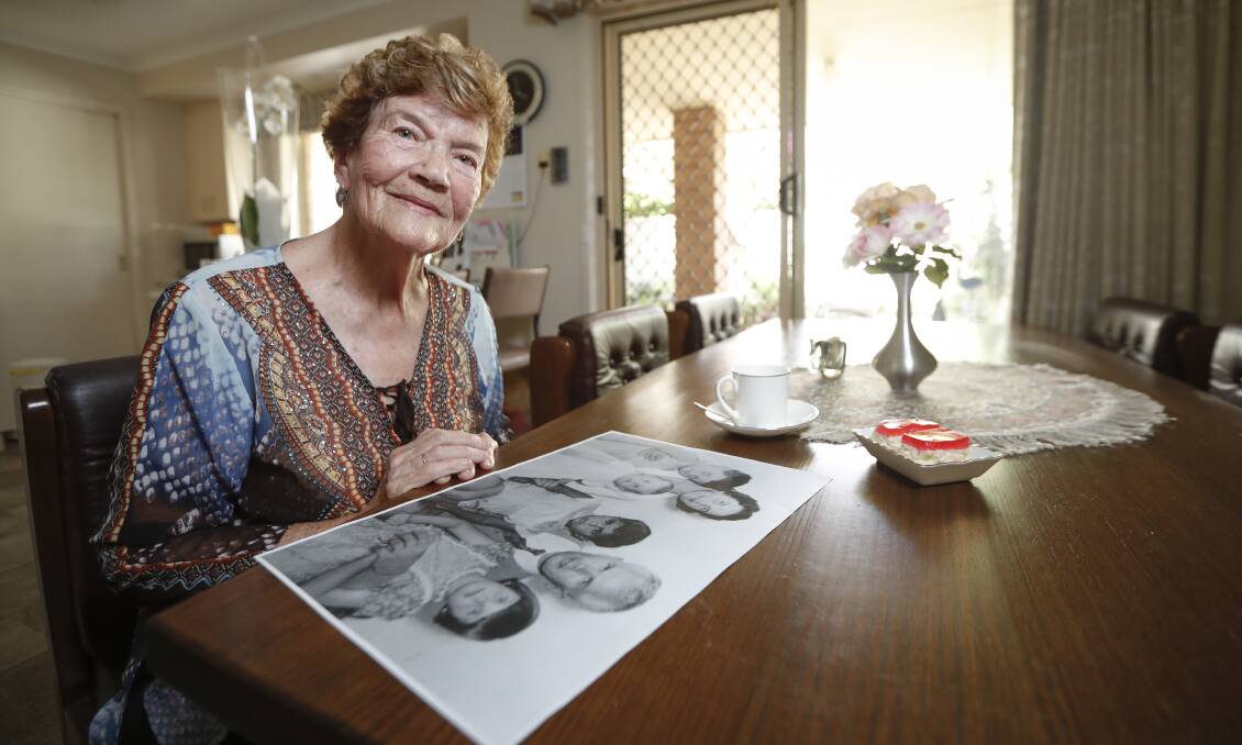 NO REGRETS: Bobby Veen's mother, Betty, looking at an old photo of the family on Tuesday. Picture: JAMES WILTSHIRE