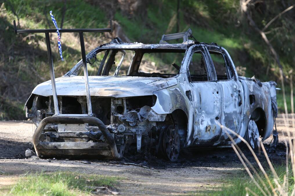 GUTTED: The distinctive white Ford ute had tools removed before being torched. 
