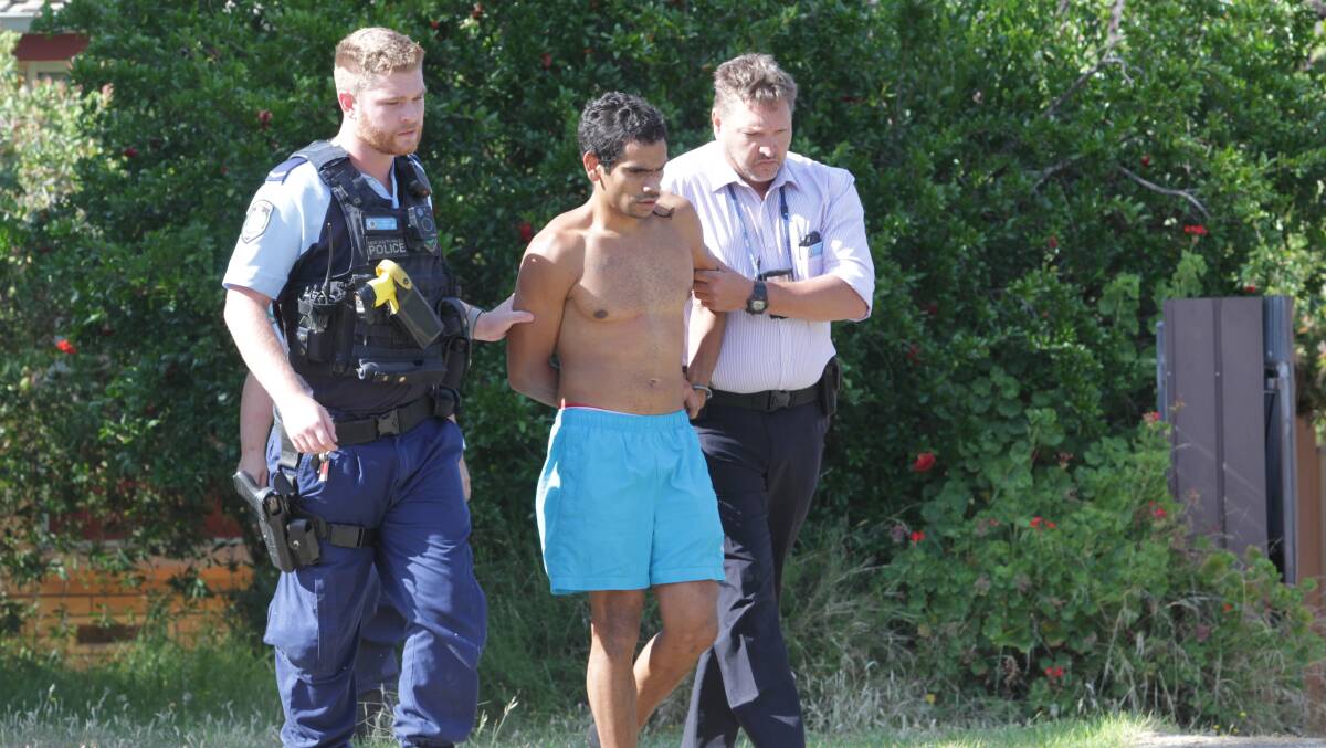 Brian Bates during a previous arrest in North Albury. File photo