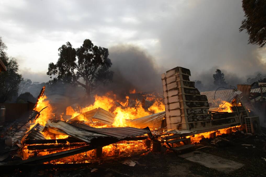 DESTROYED: The remnants of a home during the fire in December 2009. The blaze burnt 5200 hectares and destroyed houses, sheds and livestock. 