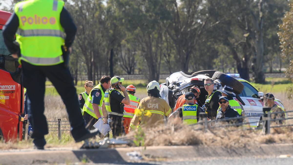 Emergency services at the crash scene. Picture by Mark Jesser