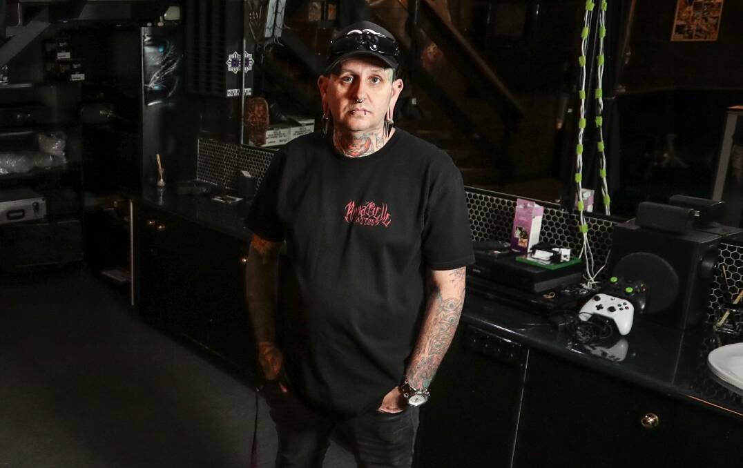 CLOSURE: Chris McFarlane in the closed Wizards of Ink tattoo studio in Albury in June. The business has officially merged with High on Ink to form Resurrection Art Collective. 