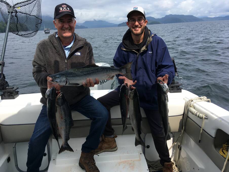 CATCH: Jeff Scammell and son Jayme on a recent trip to Alaska with a nice catch of pink and king salmon.
