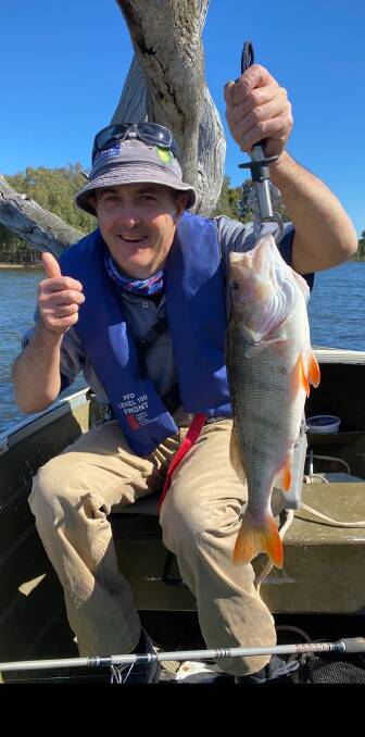 WRIGGLE ROOM: Matt Emery caught this impressive 47cm redfin at Lake Hume near Bethanga Bridge on worms. 