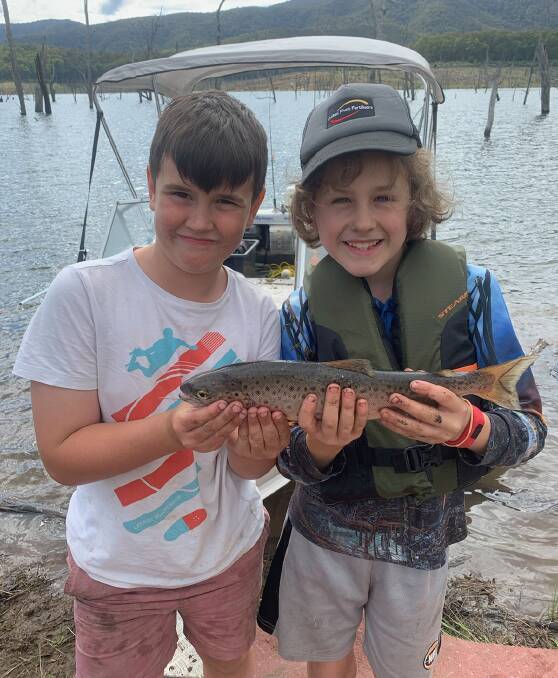 CATCH: Hunter Murray and Ben Rahaley with the trout they caught at Dartmouth Dam recently.