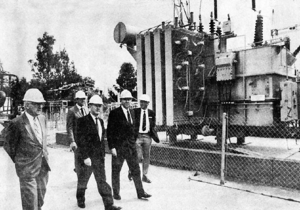 DAMAGE: Inspecting the damage, front from left: NSW Electricity Commission general manager Barry Flanagan, Member for Albury Ian Glachan and NSW Energy Minister Neil Pickard (Border Mail 15/09/89).