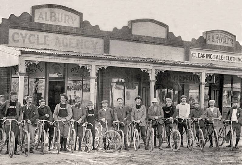 PRODUCT PLACEMENT: Local cyclists outside Albury Cycle Agency, Townsend St. Fred Blacklock (l) and Jim Scanlan (fourth from l) wear 'Swift' shirts. Scanlan and Blacklock were the Albury agents in 1899 for these imported cycles.