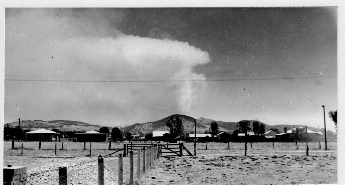 FIRE: A view of the bushfire from Gordon Street, looking west, 1952. Like Wodonga Historical Society on Facebook Photo: COURTESY OF RON HANEL.