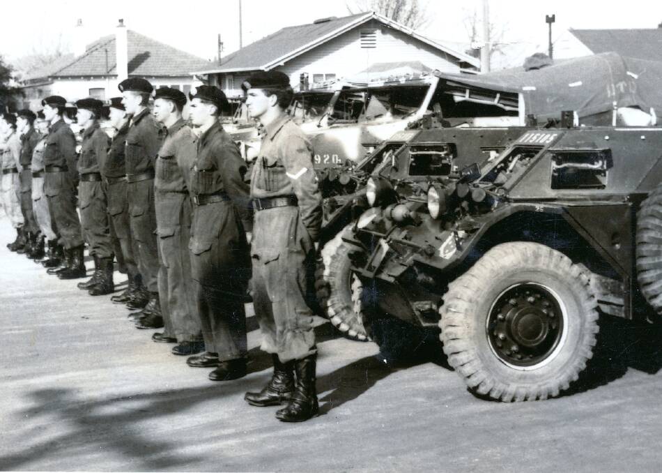 READY: Soldiers with their vehicles at the drill hall ready to move out on a weekend exercise, 1964. Training also involved weeknight parades.