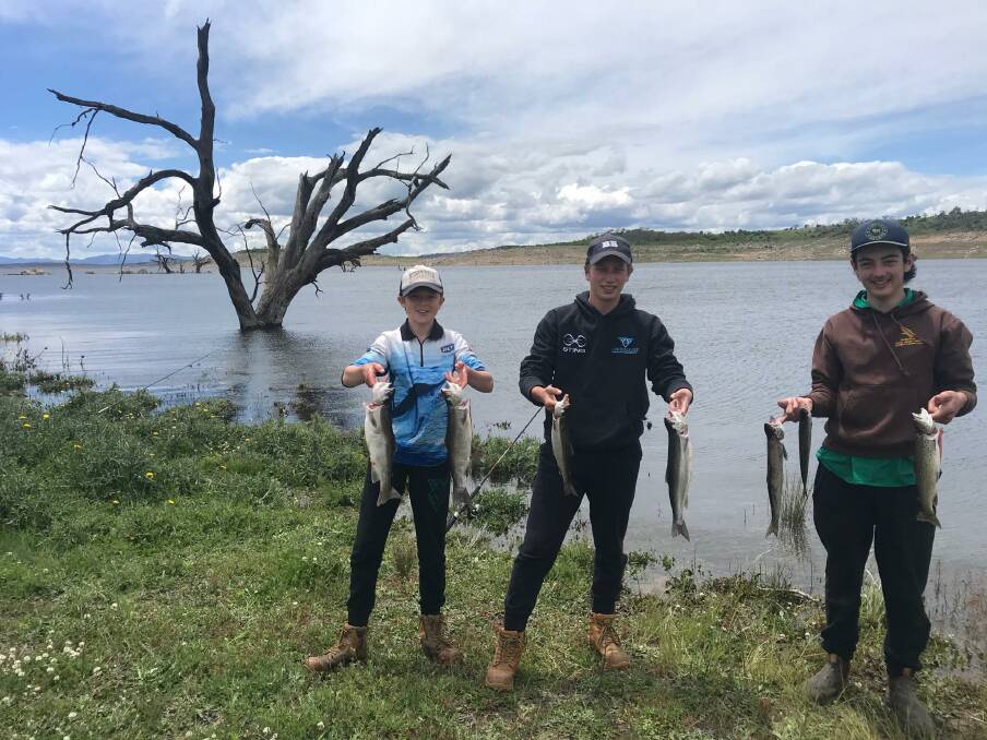 CATCH: Ben Ozolins, Ned Twycross and Brad Cardwell with some nice fish caught at Lake Eucumbene last week.