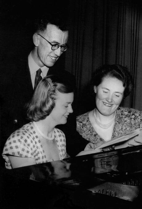 ON SONG: Stan Jackling, pianist Bette Mamouney and Joan Sutherland rehearse on December 6, 1950, for the 'Prelude to Christmas’ concert of the City of Albury Choral Society.