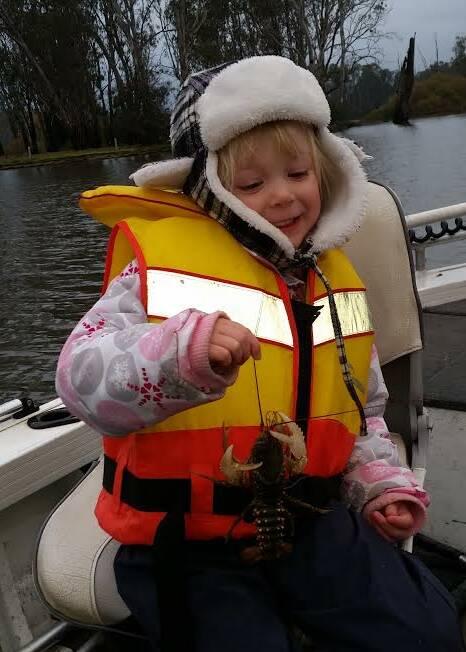 FUN: Four-year-old Araya Fraser with her her prized Murray cray.

