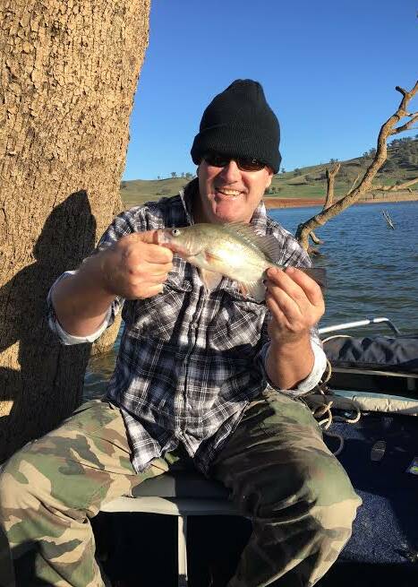 WEIR: Jai Rahaley with a nice yella he caught fishing at Hume Weir. Worms and yabbies are doing the job for anglers at this location.
