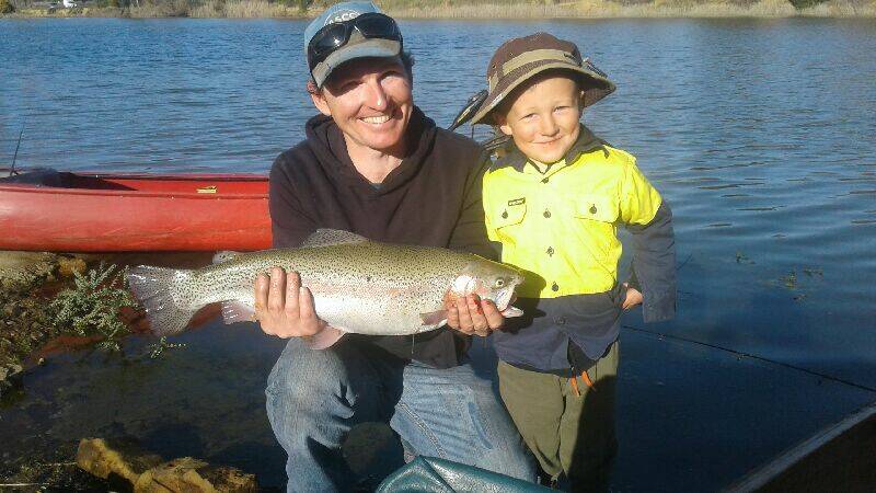PROUD: Evan Darwent and son Josh, 4, with Josh's catch of the day at Allens flat on Sunday. Enjoying the freedom while they can. Weighed in at 5lb 10oz.