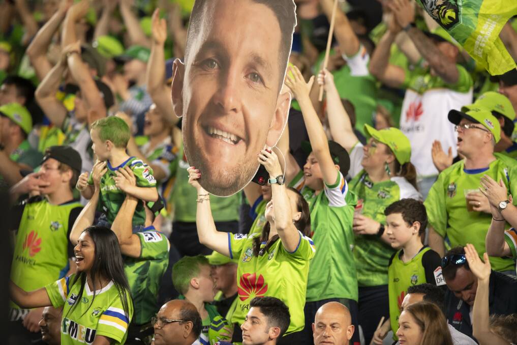 Fans cheering the Canberra Raiders during the NRL grand final. Picture: Sitthixay Ditthavong