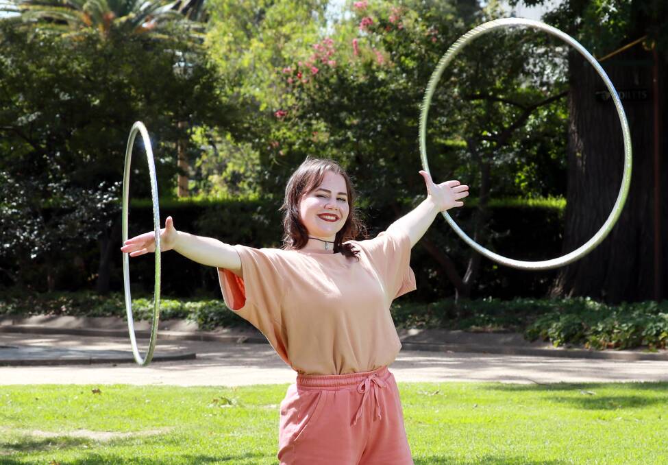 DIZZYING: Julia Erwin has just begun her hula hoop coaching business, Hooly Dooly Hooping, to encourage Wagga to get moving. Picture: Les Smith