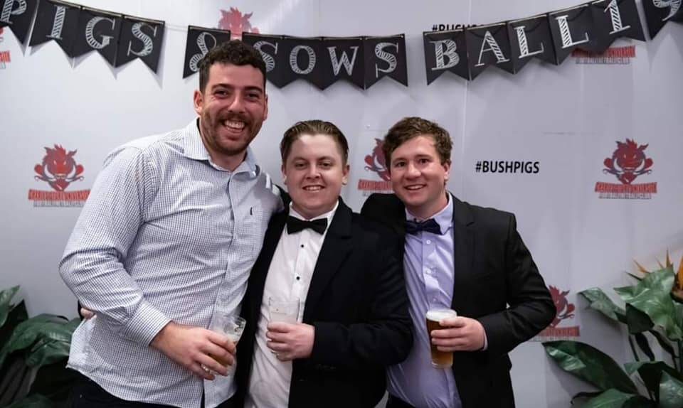 FOND MEMORIES: Dom Smith, Jack Williams and Beau Lochhead enjoy drinks, dancing and a friendship like no other at a university ball. Picture: Contributed