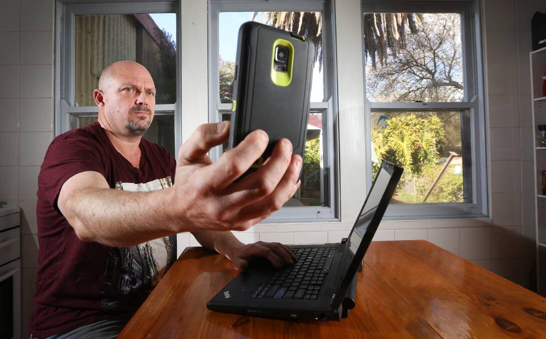 FED UP: Michael Cameron says internet reliability is so bad at Walwa he is considering giving up on his electrician business. Picture: KYLIE ESLER