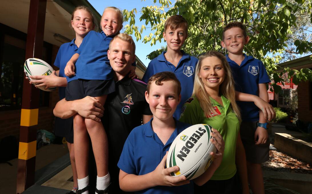 STORM CHASERS: Thurgoona Public's Elizabeth Beer, Paige Whitehead, Tyson Fitzgerald, Billy Horsell, and Jack Furze enjoyed a visit from the Storm's Slade Griffin and Albury Thunder's Courtney Barratt. Picture: JAMES WILTSHIRE