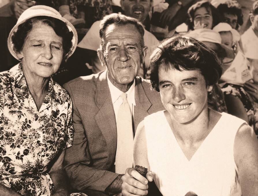 Margaret Court with her parents Maude and Lawrence after a tennis tournament victory as a youngster.