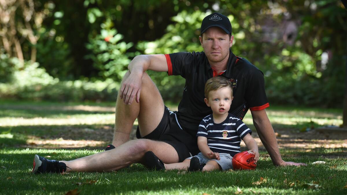 LOVE: Joel Price and his son Judd on Friday. Picture: MARK JESSER