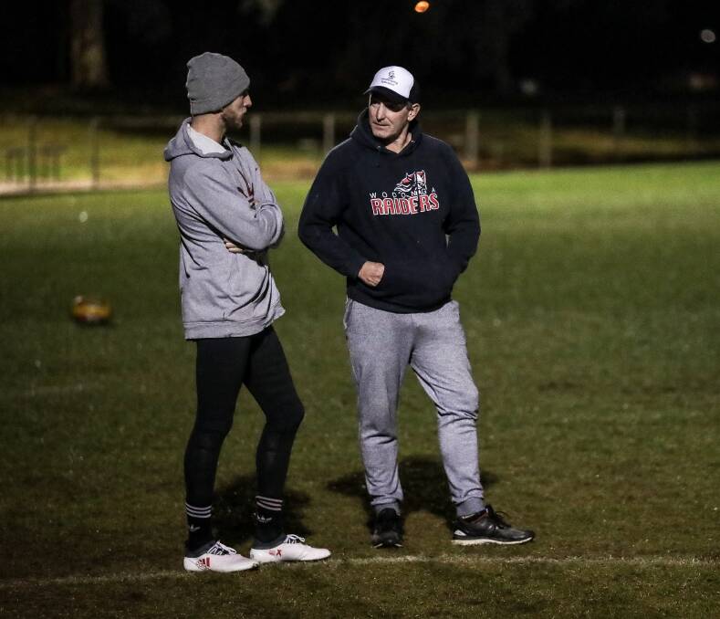 SUPPORT: Sam Murray and Daryn Cresswell at Birallee Park earlier this year when Murray returned to train with Wodonga Raiders. Picture: JAMES WILTSHIRE