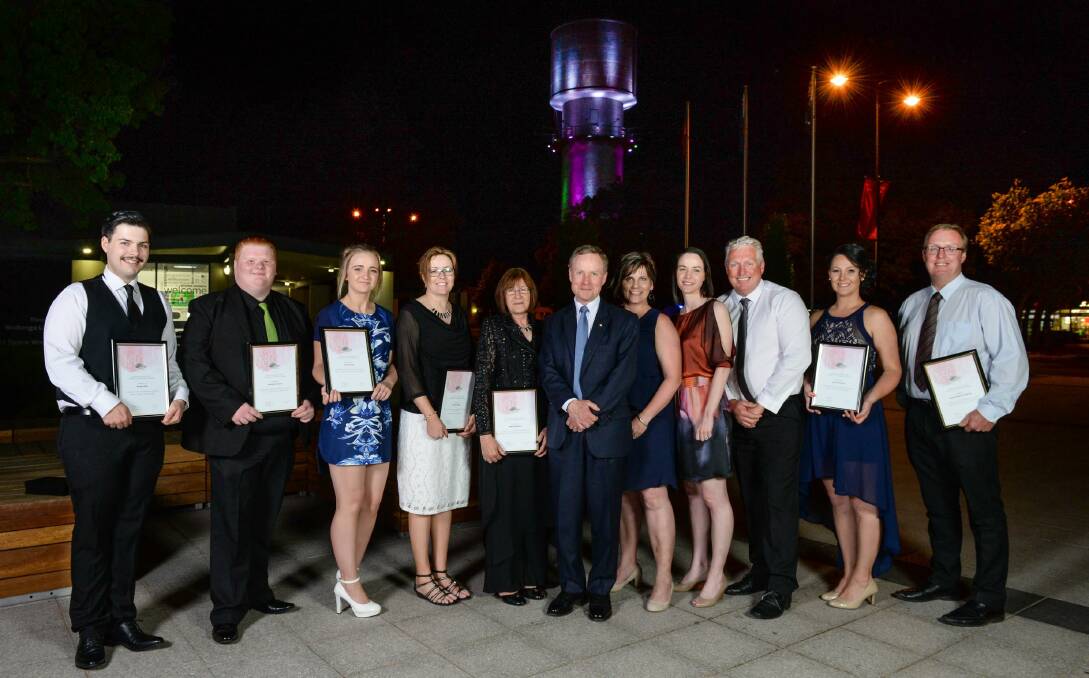 MAKING THEIR MARK: Australian of the Year David Morrison, centre, with Wodonga TAFE's award winners on Monday night. Picture: MARK JESSER
