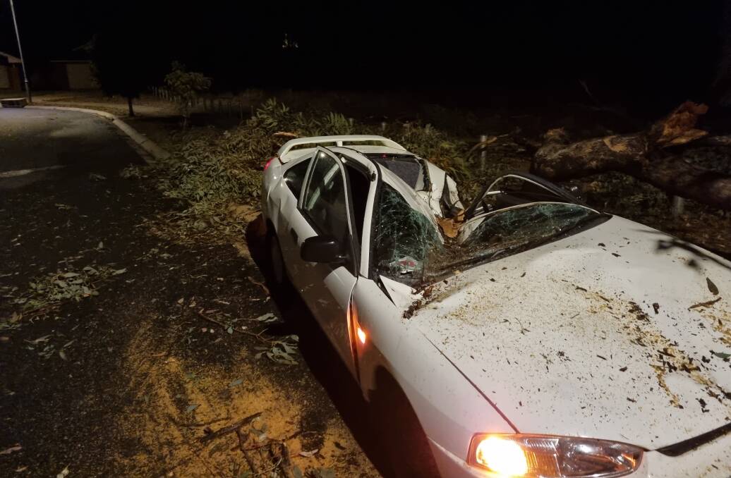 Multiple fire trucks attended a home in Songlark Crescent in Thurgoona after a tree fell on a car about 8pm on February 13. Picture supplied.