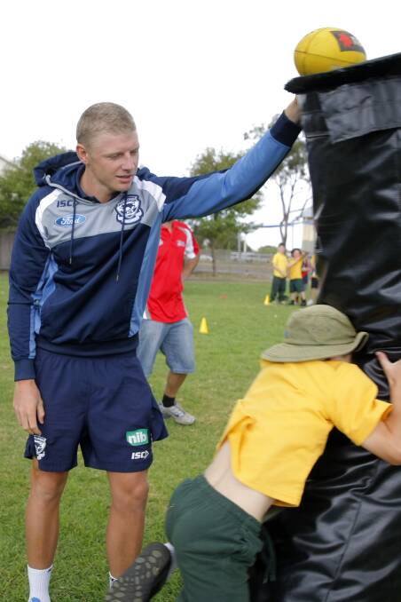 Taylor Hunt, when he was a Cat, during a kids clinic at Warrnambool. Picture: THE STANDARD