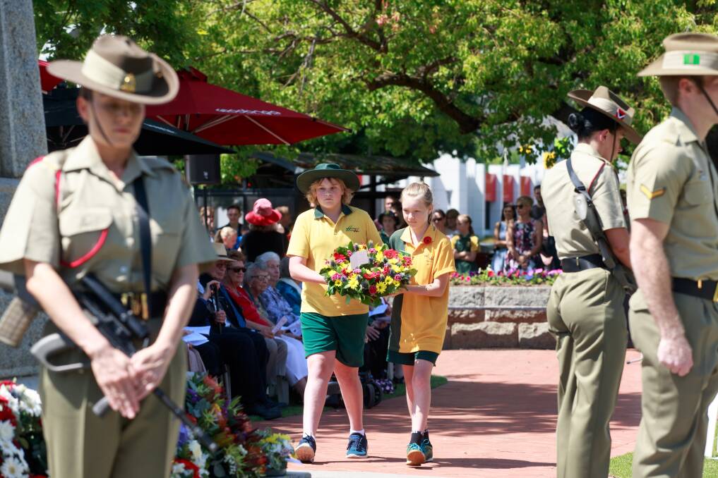 PAYING THEIR RESPECTS: A strong crowd turned out to Woodland Grove in Wodonga on Remembrance Day last year.