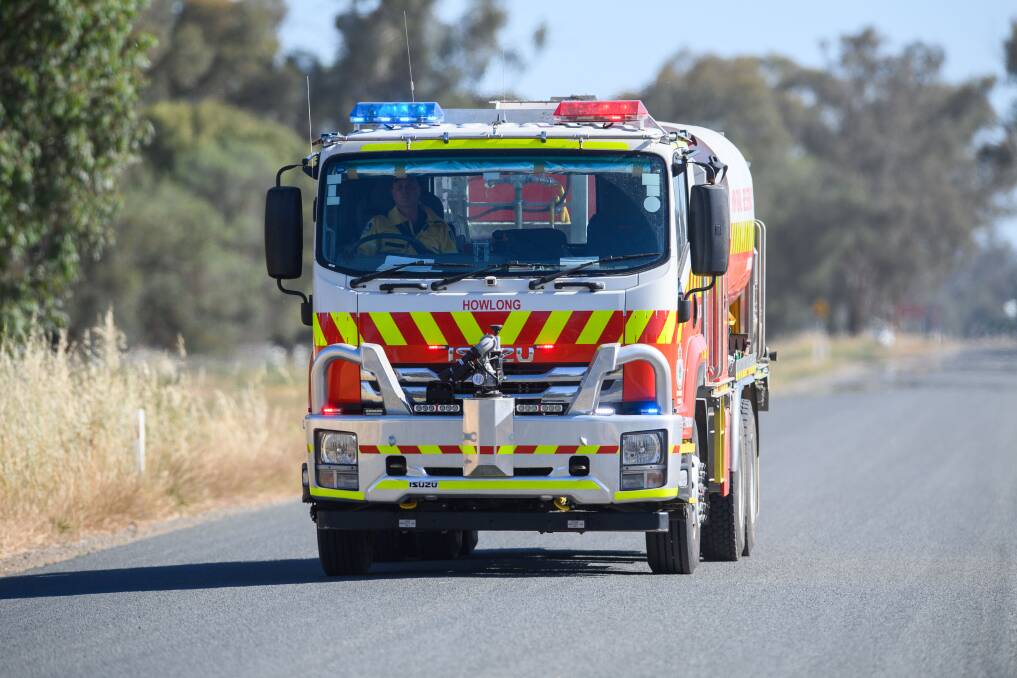 Reports of a major crash crash came through at 2.40pm on the Howlong-Balldale Road as two trucks carrying grain collided. Pictures by Mark Jesser