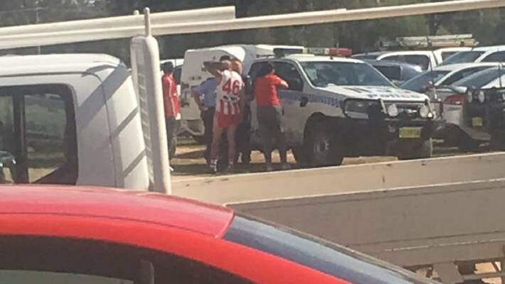 Henty's Jarrah Maksymow speaks to police before leaving the Hume league semi-final mid-match in mysterious circumstances.