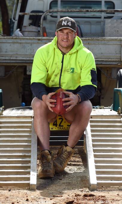 RAMPING IT UP: Tallangatta and District league best and fairest Jarrad Farwell takes time out at work ahead of Rutherglen's qualifying final. Picture: MARK JESSER