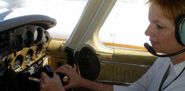 Ms Ley at the controls of her light plane. Photo: Supplied